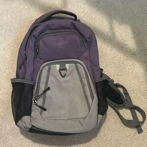 Purple, gray and Black backpack. In very good condition.